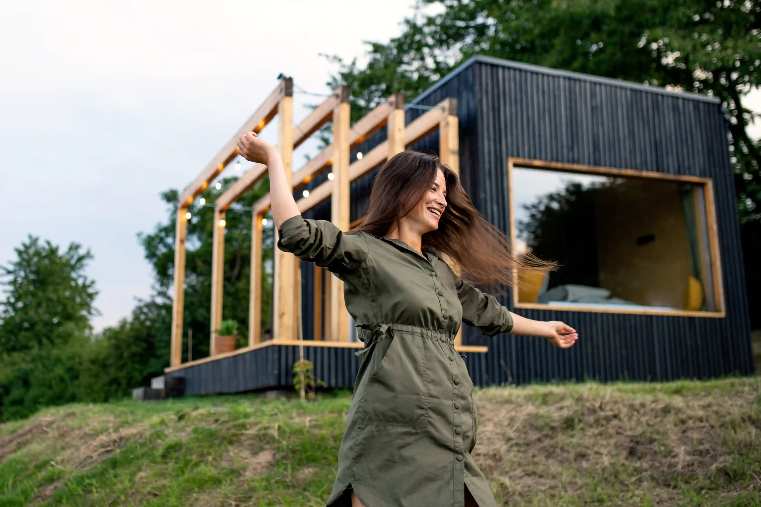 young-woman-outdoors-weekend-away-in-container-ho-2026-01-05-22-59-58-utc